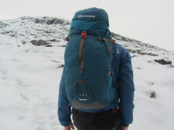 Medusa being used as a daypack in the snow