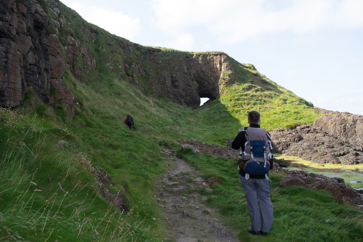 The trail passes through the rock