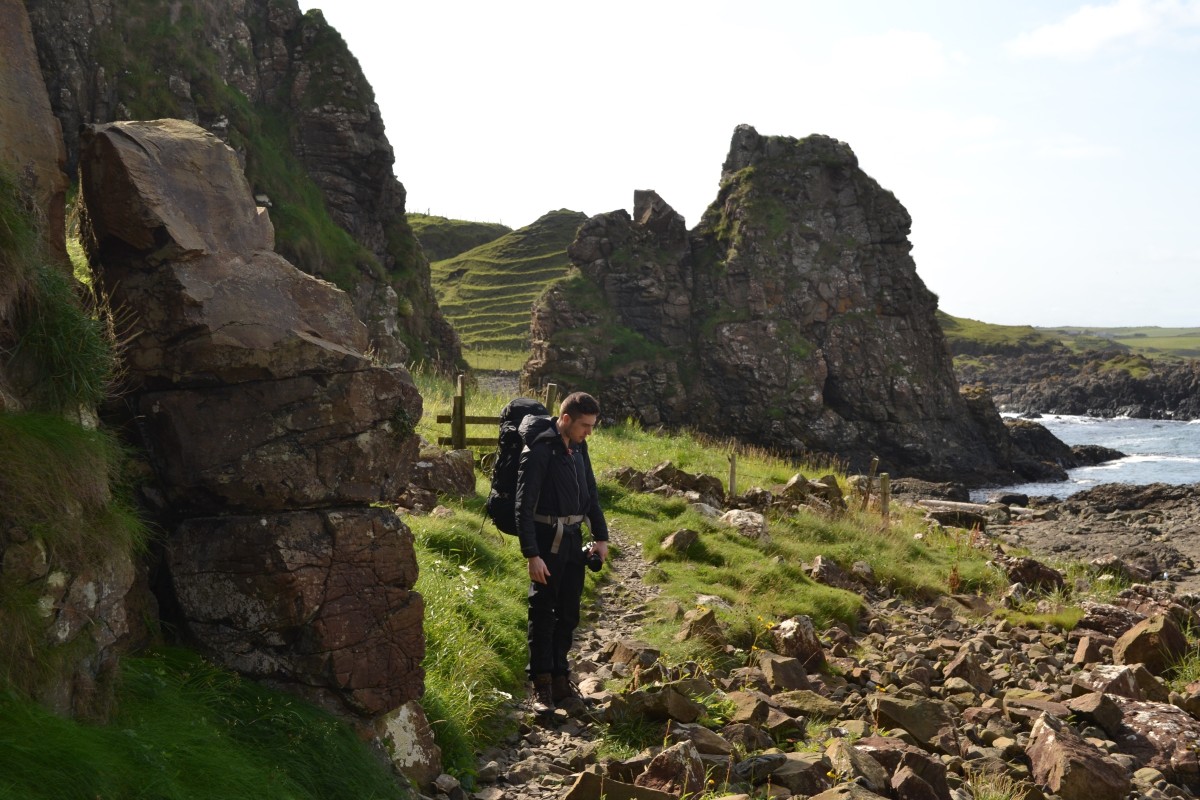 Note the striations on the hillock in the background